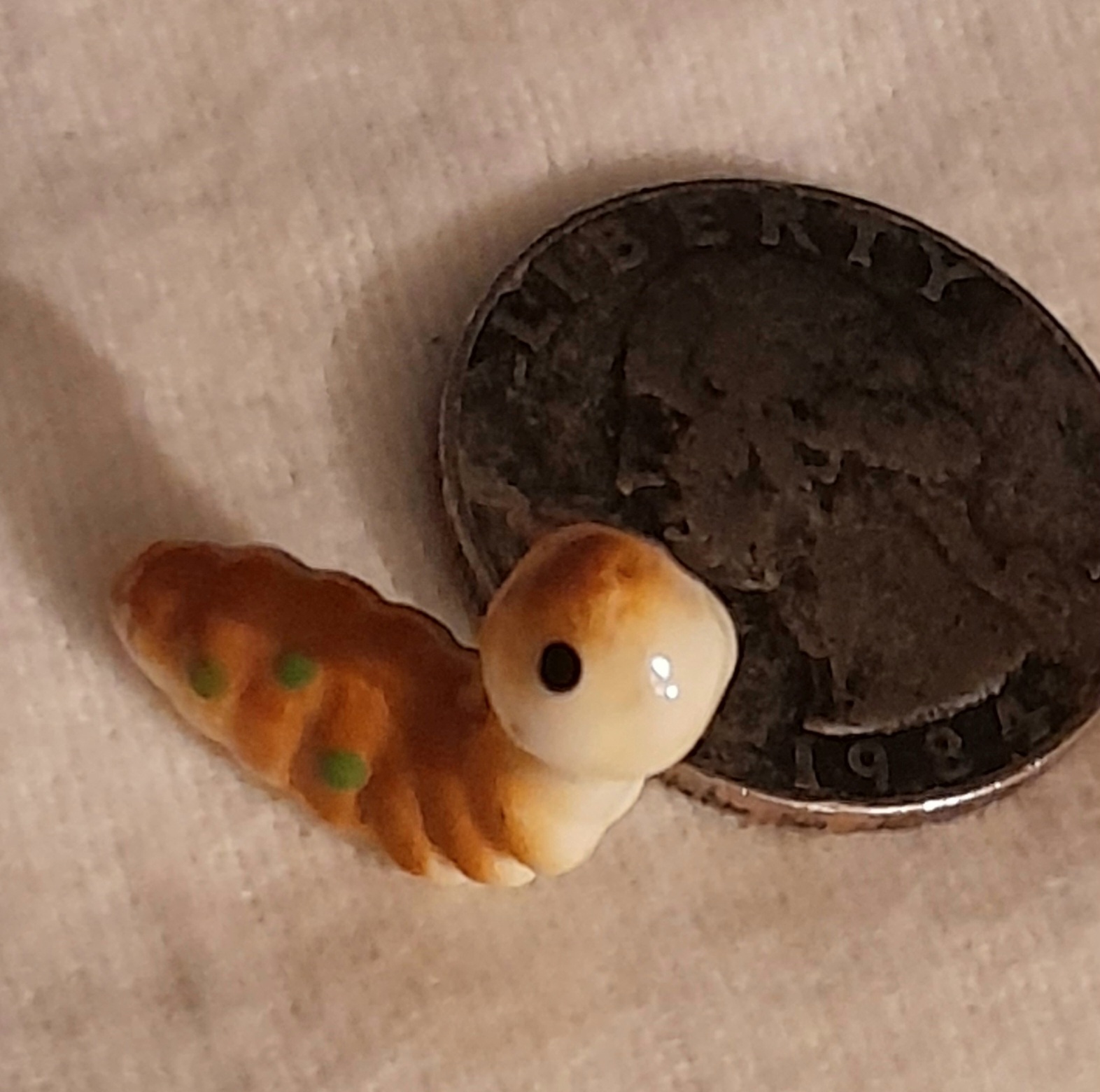 FREE: vintage tiny porcelain caterpillar 