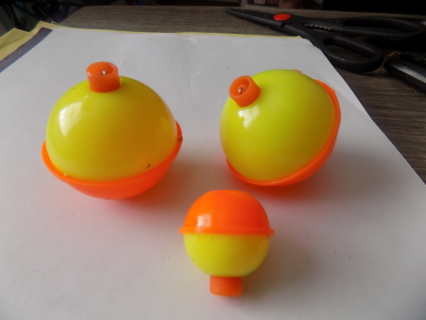 3 orange and yellow snap on fishing bobbers 1 1/4 inch