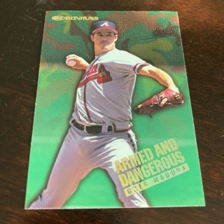 1997 Donruss - Armed and Dangerous #13 Greg Maddux #/5,000