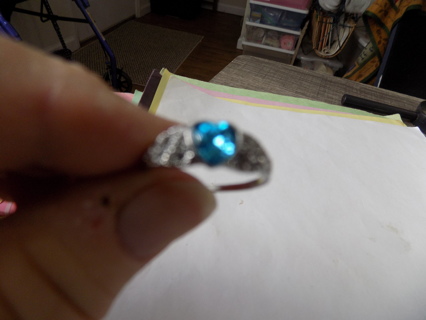 Silvertone thin band ring size 10 with aqua heart stone
