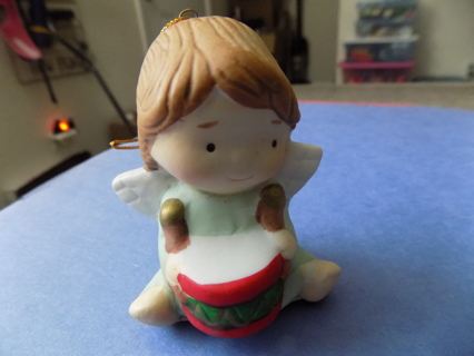 Vintage ceramic angel cherub ornament beating on a drum 2 1/2 tall green gown