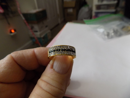 ring # 10 goldtone wide band sz 8 1/2 2 rows clear stones, black stones in middle