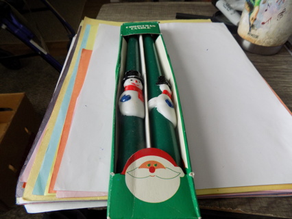 NIP Pair of green Christmas taper candles with 3D snowmen on them