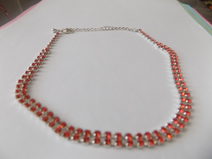 Necklace choker style 2 rows orange rhinestones, silvertone chain in back lobster catch