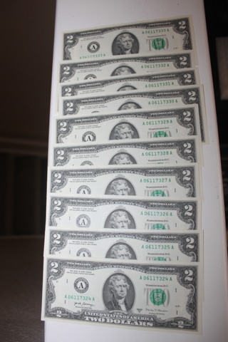 10 -$2.00 UNC. WITH SERIAL #'S IN SEQUENCE