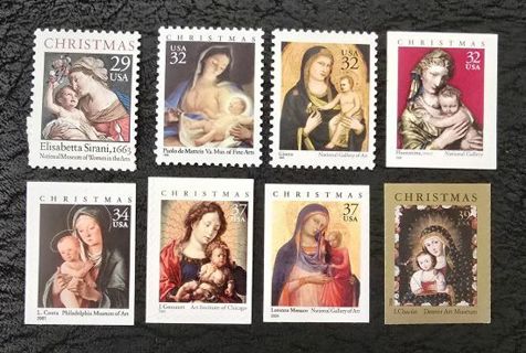 Eight Mint Xmas US Postage Stamps