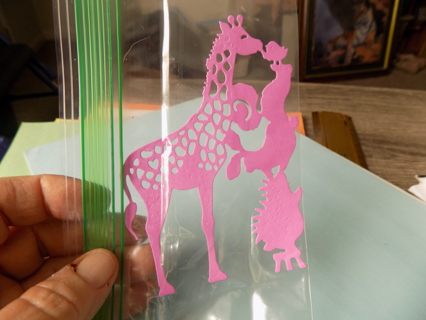 Pink diecut animals standing on each other to kiss a giraffe 5 inch