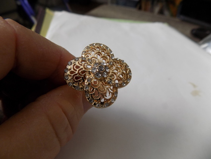 Adjustable gold tone wide band ring with 4 round petal flower filigree & rhinestones