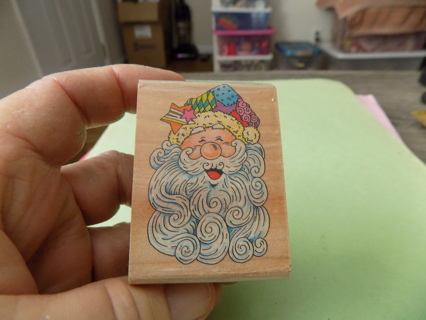 2 inch wood mount rubber stamp Santa face laujghing wears patchwork quilt hat