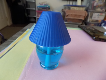 Blue lamp & shade shaped liquid air refreshener 3/4 full
