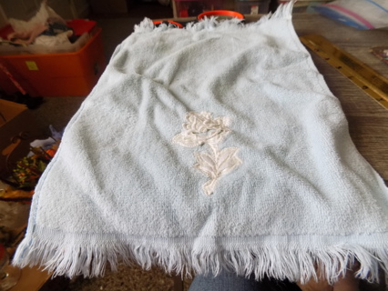 Light blue Martex hand towel fringed with white rose applique