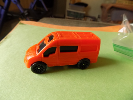Orange plastic 2 1/2 inch race car