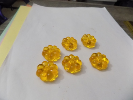 Set of 6 yellow multi petal flower shape embellishments