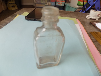 3 inch tall clear glass medicine bottle flat side front & back