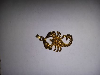 Bronze colored scorpion charm