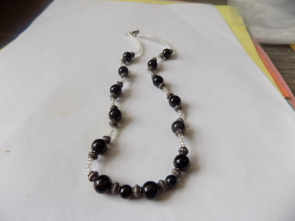 Necklace choker style black and clear beads, lg black beads, small ribbed silvertone,clear E beads