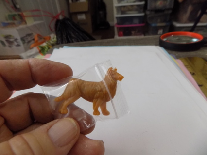 2 inch tan hard  plastic collie dog