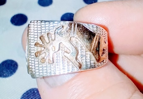 RING MEXICAN FERTILITY RING STERLING SILVER TESTED AND A SIZE SEVEN AND A SUPER STEAL OF A DEAL.