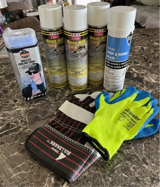 4 cans of wasp spray & 2 pairs of gloves & cooling towel 