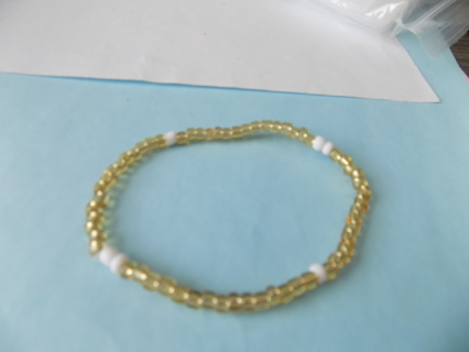 Bracelet E beads yellow and 6 white