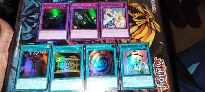 7 mint condition ultra rare and super rare holos Yugioh spell and trap cards